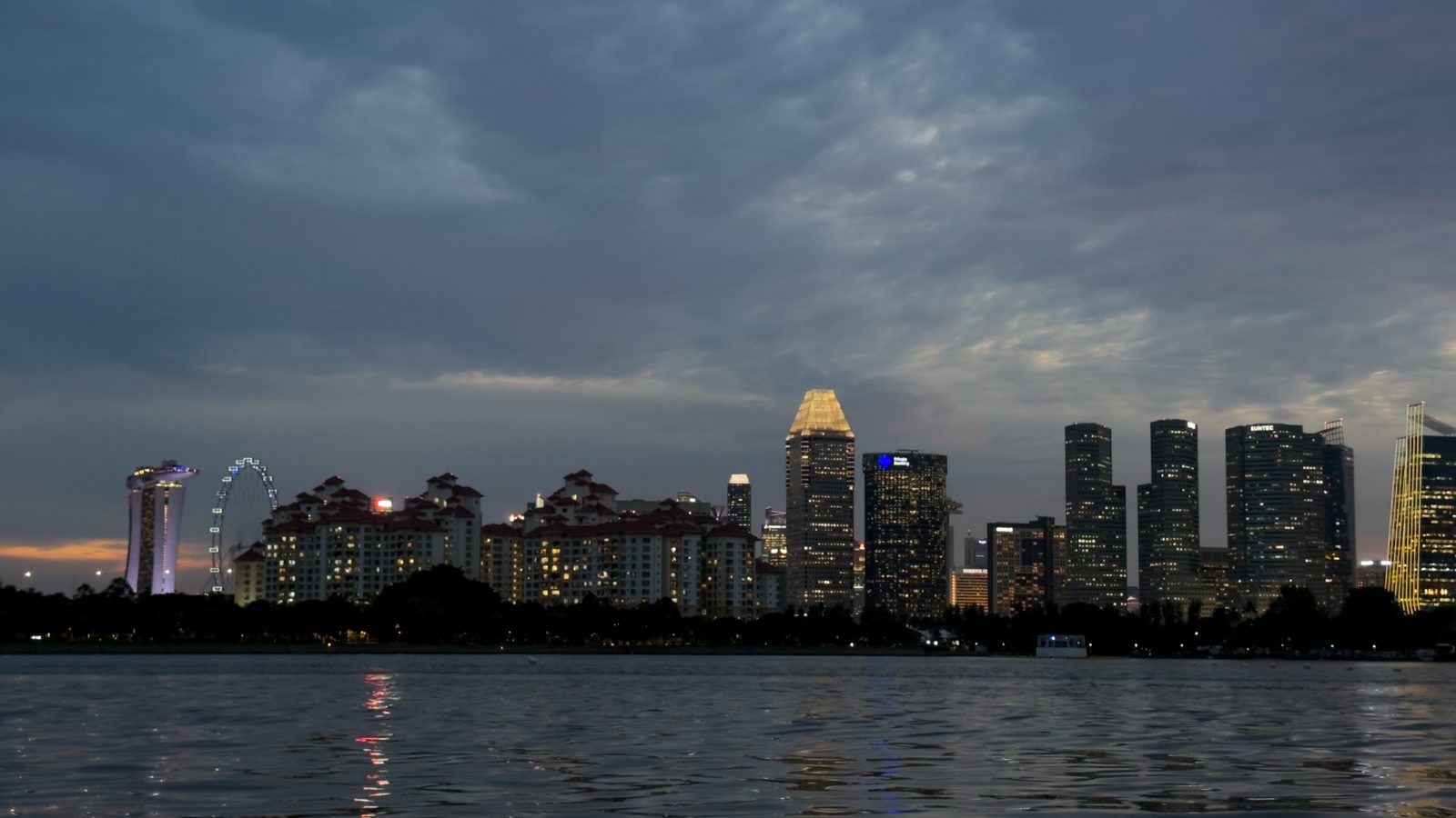 Singapore skyline at dusk across the water